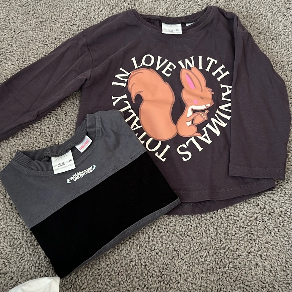 Never worn unisex long sleeve shirts